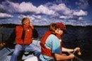 Biologist, Pam Bishop, samples Lake Charlotte for phycology; looking on is a lake stakeholder, Rodney Frail!