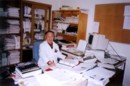 Virologist, Spencer Lee, at his office, QEII Labs