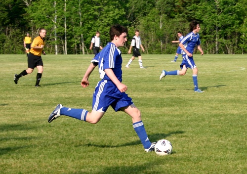 David playing soccer