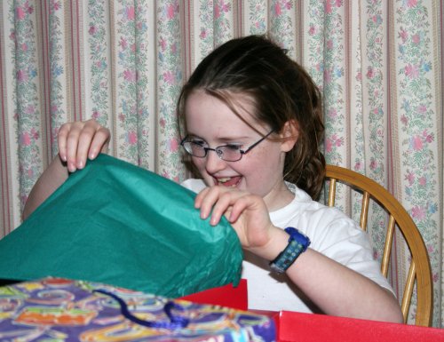 Emily opening a present
