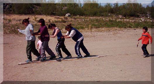 adult log race for Aboriginal Day